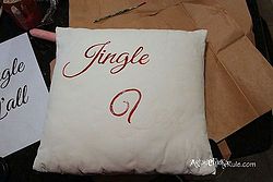 jingle y all thrifty pillow makeover w chalk paint, chalk paint, crafts, painting, seasonal holiday decor, Hand painting in the lines the lettering onto the pillow