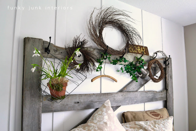 how to create your own headboard from junk, bedroom ideas, crafts, doors, home decor, repurposing upcycling, An old horse gate found on someone s burn pile is now my headboard with hooks changeable with every season Fun Visit post at