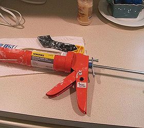 how to caulk the easy way without the mess, home maintenance repairs, how to, First you gotta have a good caulking gun Make sure it is spring loaded like this one The spring loaded action helps push out the caulking with even pressure so that it is evenly distributed as you apply