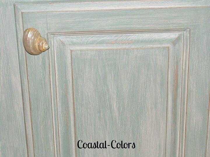 beachy bathroom cabinets, bathroom ideas, chalk paint, kitchen cabinets, painting, First the cabinet was painted with a custom mix blue white washed with an off white distressed lightly and clear coated
