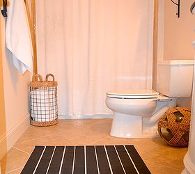 coastal bathroom makeover, bathroom ideas, home decor, The black and white striped rug is from IKEA