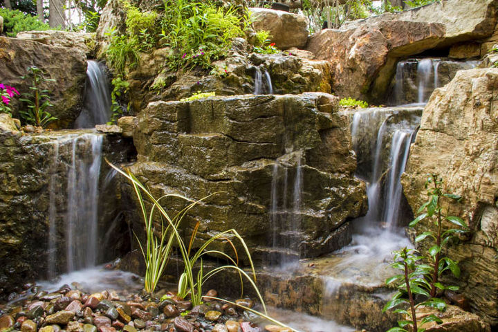 waterfalls for window wells, Creative use of rock provides inspiring scenery