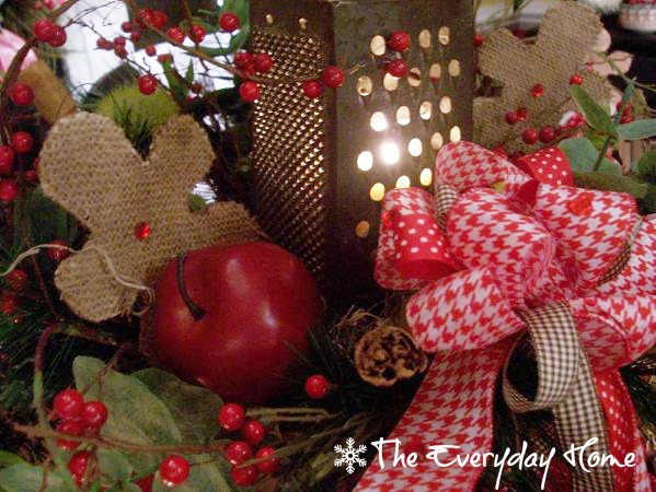vintage grater as a luminary in a gingerbread themed arrangement, crafts, repurposing upcycling, A country gingham bow adds color