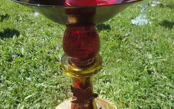 This is a birdbath I made from reclaimed glass vases, plates, bowls and an ashtray, glued together with epoxy.