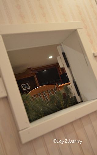under the stairs playhouse inside and out who says girls can t build, home decor, woodworking projects, Looking out into the Family room Hey I can see the TV