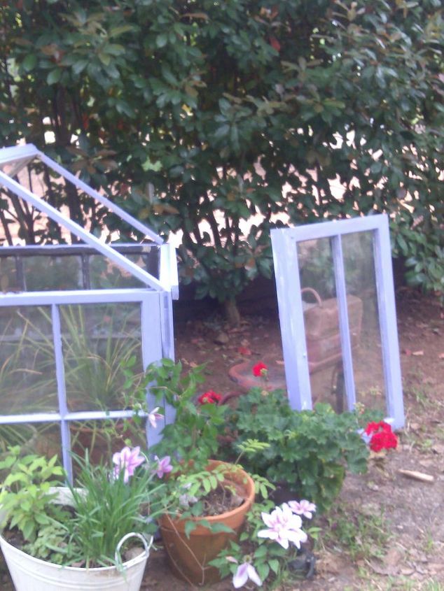 flowerbed greenhouse my husband and i made, diy, gardening, we made half of the top so that it can be removed so can set plants in it also a hook to hand them
