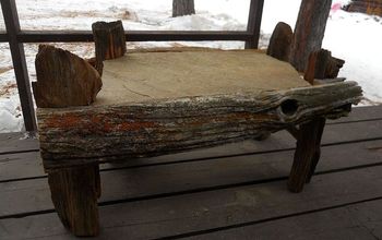 Old or Discarded Fence Posts & a Rock Turn Into Table