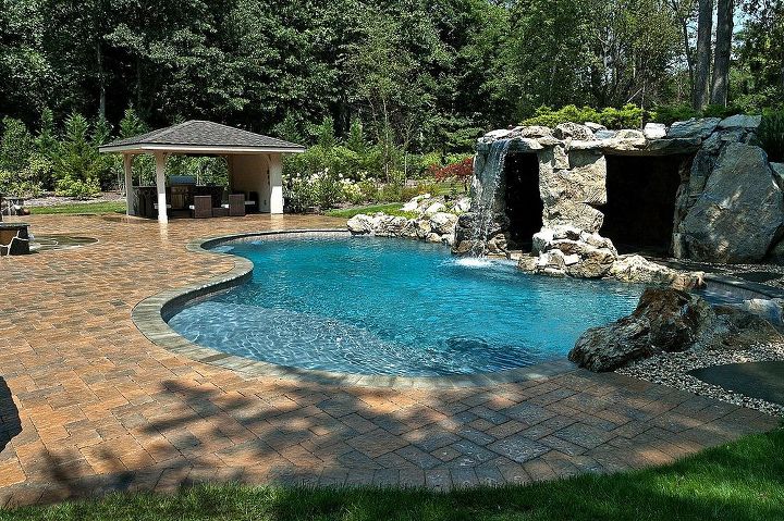 some of our best projects are a result of a referral from some one who did not use us, concrete masonry, outdoor living, pool designs, spas, Freeform pool with tanning shelf and spa waterfall and grotto