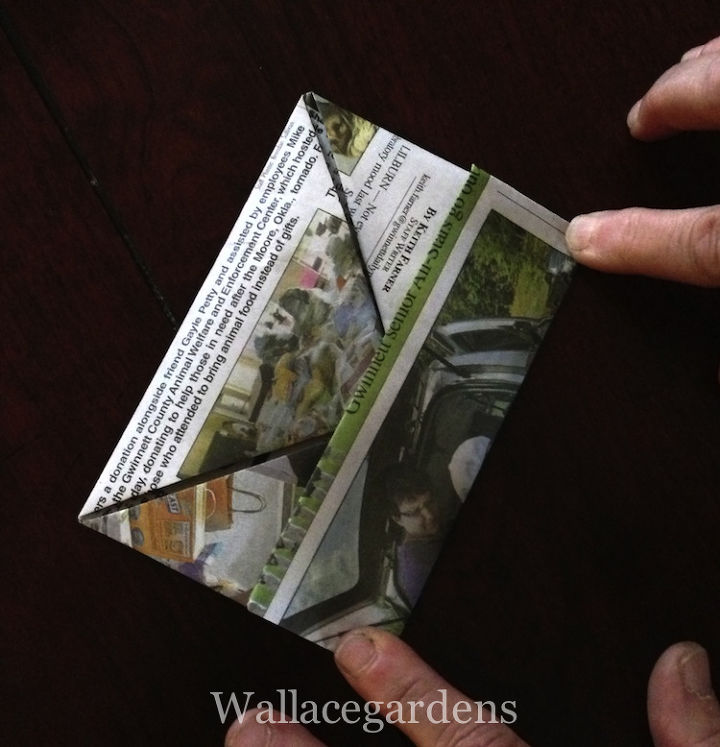 origami paper seedling pots from newspaper, Next fold into thirds evenly making crisp creases Open it up and
