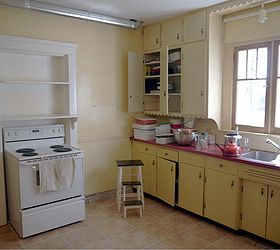 kitchen renovation in 1918 farmhouse, home decor, kitchen backsplash, kitchen design, living room ideas, exposed ductwork from previous reno and stove placed in a niche in the wall from an old doorway