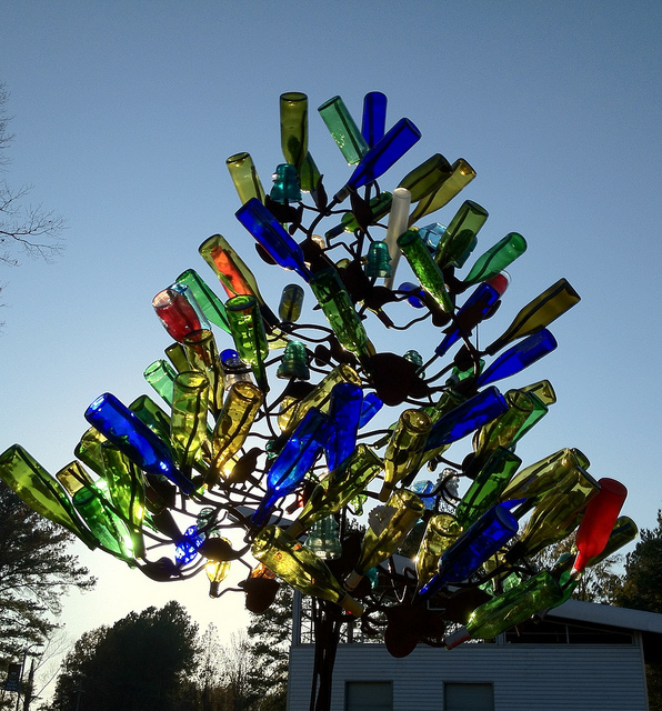 cool and crazy uses for empty beer bottles, repurposing upcycling, This is a bottle tree Photo redagain Patty flikr