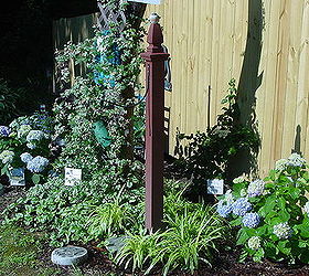 honored to host our first home garden tour this spring, flowers, gardening, outdoor living, I got the idea for a garden hose post from Pinterest