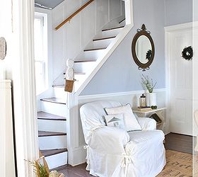 the secret to dealing with quirky room challenges, home decor, A club chair provides comfy seating along a wall wedged between the staircase and laundry room door