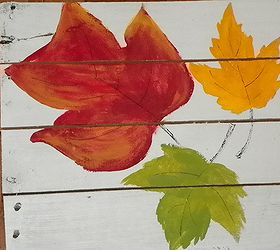 easy to make pallet yard art, crafts, pallet, seasonal holiday decor, Here are the random leaves that I painted different colors