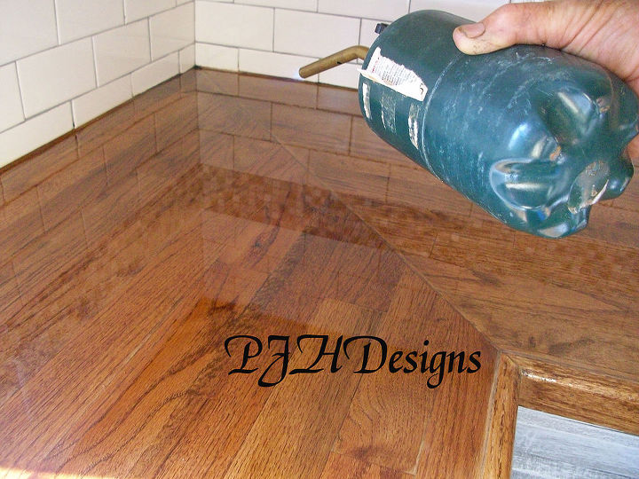 my kitchen remodel diy butcher block countertops, countertops, kitchen design, Apply heat to remove bubbles in poly