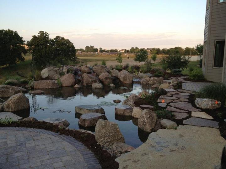 large water garden in the des moines iowa metro, outdoor living, patio, ponds water features, To learn more about our pond construction https www facebook com notes just add water pond fish koi pond backyard landscape pond aquascape ecosystem pond water garden 478461102188914 Aquascape Ecosystem Pond Water Garden Koi Fish