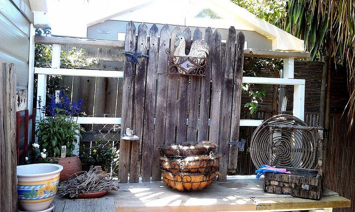potting table from 100 reclaimed items, gardening, painted furniture, pallet, repurposing upcycling, This used to be a gate to the yard to my tack room which had seen better days Now it gives character and vertical interest to the table
