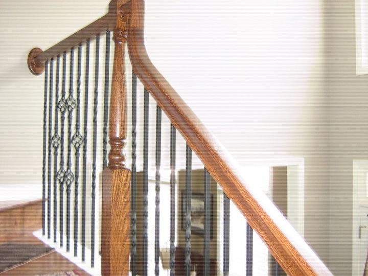 custom staircase with iron baluster