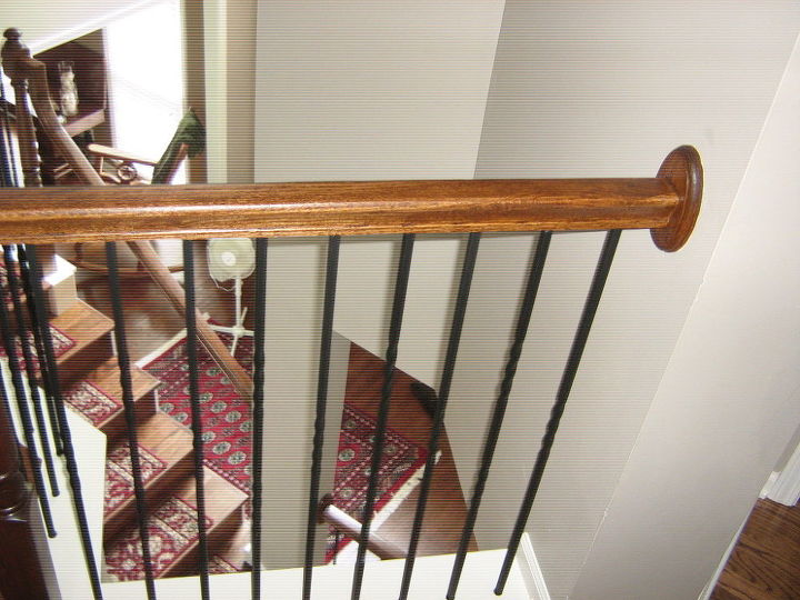 custom staircase with iron baluster