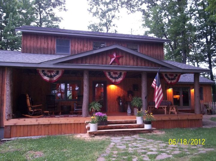 our newest rustic addition, outdoor living, porches, We have spent many days and nights relaxing in our rockers on our new front porch The perfect spot for grillin and chillin