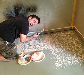 lace stencil floor transformation, bedroom ideas, flooring, home decor, painting, Brook of Bella Tucker Decorative Finishes in process on his stenciled floor transformation