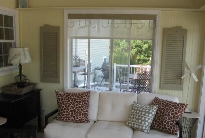 three season porch decorated with repurposed outdoor details, porches, repurposing upcycling, Painted shutters and garden fence for a window treatment