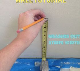 painting a striped accent wall tutorial, bedroom ideas, paint colors, painting, wall decor, After that step I began measuring out where I wanted my to tape out my stripes My measuring method Begin with measuring the floor to ceiling 100 inches With the number you measure you will take that number and divide it by