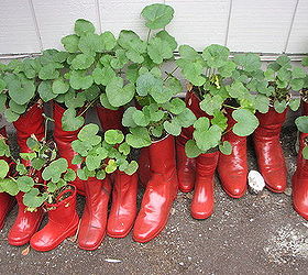 bbq party favors, gardening, repurposing upcycling, Put one hole in bottom of each boot and put pea gravel in to weigh them down Lined our driveway with them to greet our guests