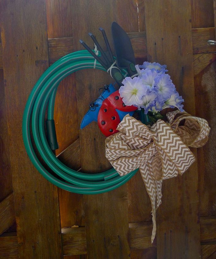 beginning to look like spring, Hose wreath number two yep I am so cheap er thrifty that I cut one hose in two