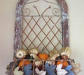 my fall front porch, porches, seasonal holiday decor, In the entry nook I spray painted dollar store gourds a pack of leaves mixed them with sugar baby pumpkins