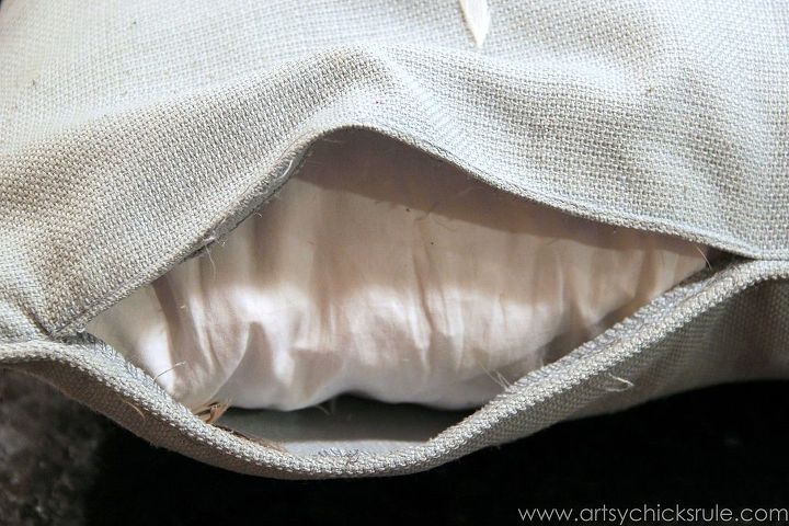 feather pillow fail and a simple no sew fix, crafts, home decor, living room ideas, Opening the seam to remove feather insert and all those feathers