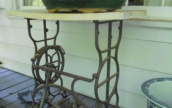 Here is a creative idea for an old sewing machine base, do you have any other creative ideas?