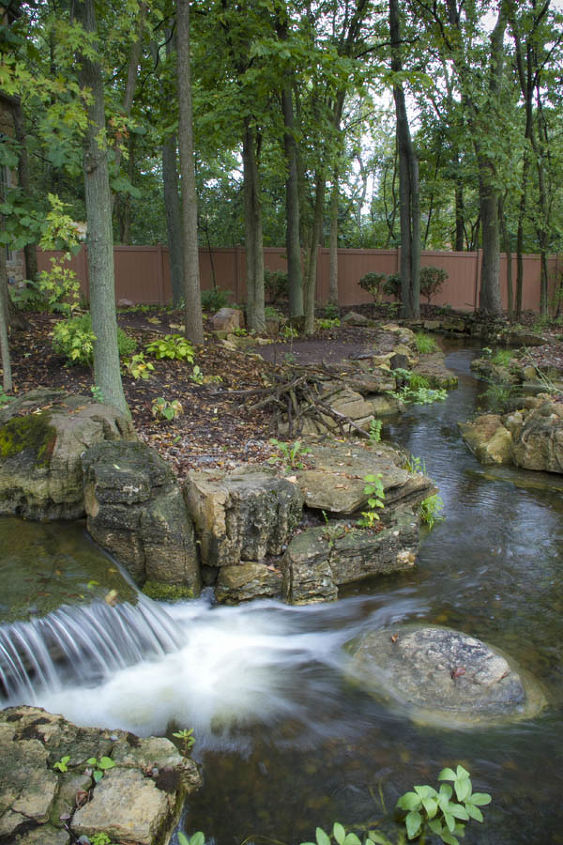 expansive waterfalls and pond in crown point indiana, outdoor living, patio, ponds water features, The water slows in spots and speeds up in other places just like you would see in nature
