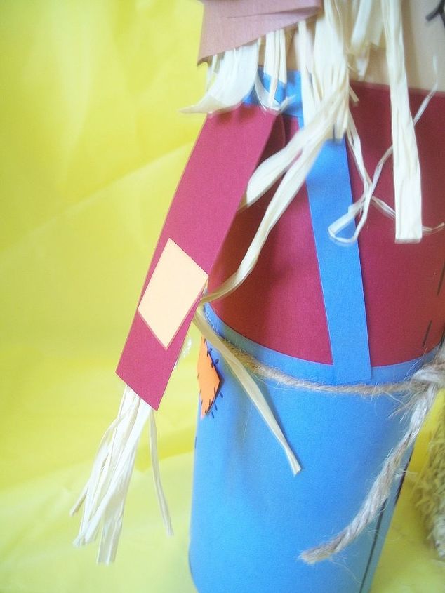pringles can scarecrow, crafts, Add details to your scarecrow by adding patches and Overall straps using scraps of paper