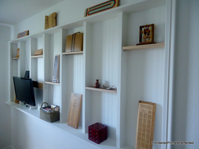 our always in progress home tour, home decor, The upstairs game nook We collect cribbage boards and needed a place to display them so we created this built in recessed shelving