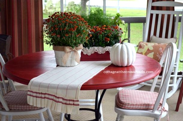 sprucing up the front porch for fall, outdoor living, painting, porches, seasonal holiday decor, paint color of table Crimson by Valspar