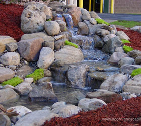 pondless waterfalls rochester ny design, landscape, ponds water features, Acorn Designs Pondless Waterfalls in Rochester NY with LED Low Voltage Landscape Lighting for this Commercial Property Contact Acorn now to learn more 585 442 6373