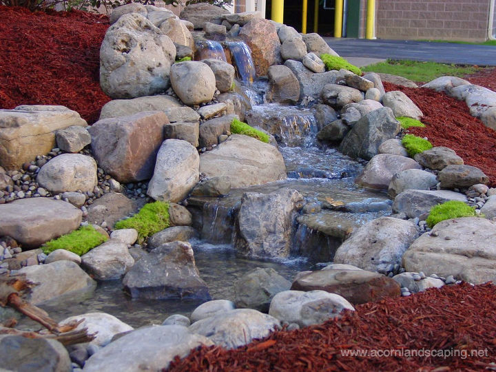pondless waterfalls rochester ny design, landscape, ponds water features, Acorn Designs Pondless Waterfalls in Rochester NY with LED Low Voltage Landscape Lighting for this Commercial Property Contact Acorn now to learn more 585 442 6373