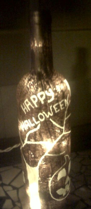 i upcycled empty wine bottles into halloween lamps, crafts, halloween decorations, seasonal holiday decor, etched