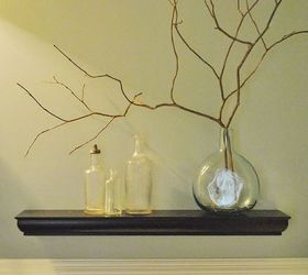 powder room makeover, bathroom ideas, home decor, Antique bottles and branches from the backyard add to the nature themed accessories to the room