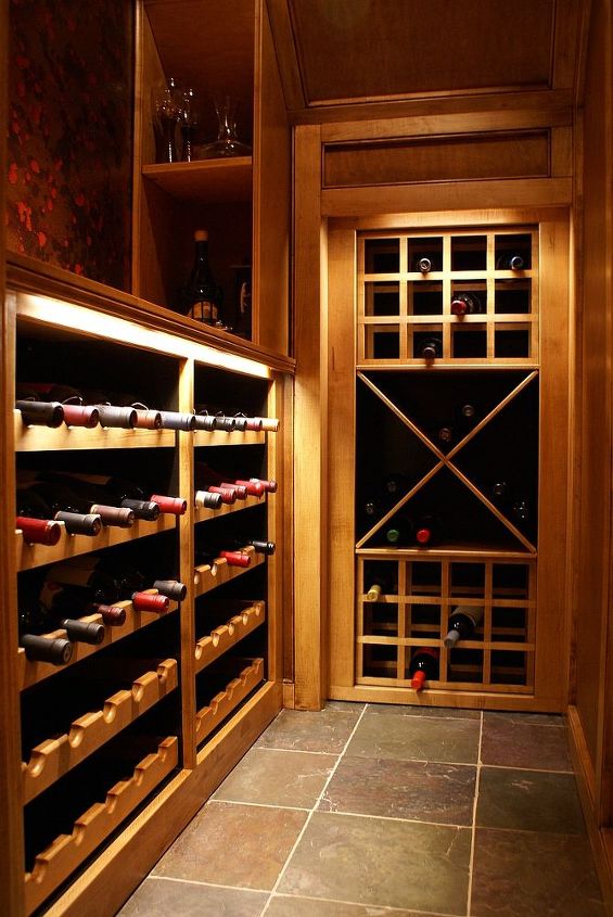 remodeling ideas for every budget, bathroom ideas, bedroom ideas, kitchen design, living room ideas, outdoor furniture, outdoor living, small bathroom ideas, Wine cellar underneath basement stairs with pull out storage for wine cases rear section slides back