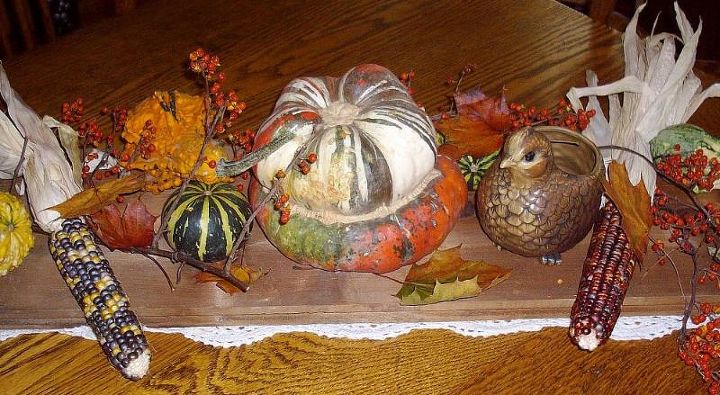 gourds and squash a chippy boat a vintage doorknob and a grape pie, seasonal holiday d cor