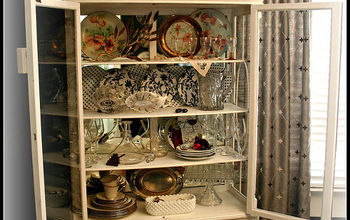After countless hours of work I finally finished making over my china cabinet!