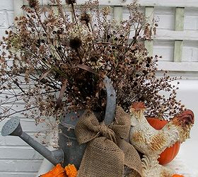 my favorite garden repurpose potting sink fountain, gardening, outdoor living, seasonal holiday decor, thanksgiving decorations, Thanksgiving dried seed heads pods in an old galvanized watering can