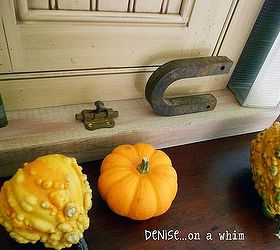 a cupboard door becomes a shelf, crafts, doors, kitchen cabinets, repurposing upcycling, shelving ideas, Add a few pumpkins and some rusty metal to get an instant fall vignette