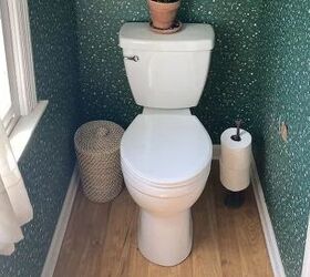 Ready to give her bathroom some extra drama, she tore up her laminate & did this