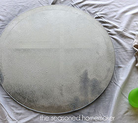 diy faux antique glass mirror, crafts, home decor, living room ideas, repurposing upcycling, I first sprayed the mirror with a 50 50 mixture of vinegar and water Then I sprayed Krylon Looking Glass paint over that and blotted