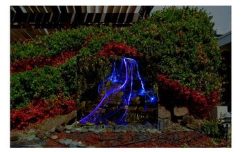 Waterfall in the front terrace of the yard, enhanced with Fiber Optic Lighting!!!!