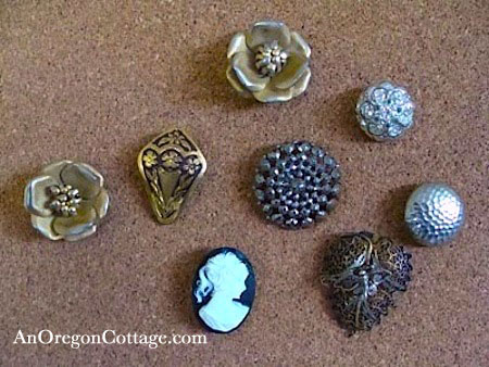 use vintage jewelry and buttons to make push pins, crafts