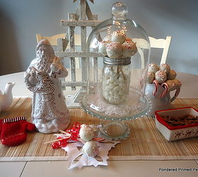 our holiday party prep with hometalk and wayfair, christmas decorations, seasonal holiday decor, The dining table holds treats and decorations to layered together My Christmas Cake Pops take center stage inside the Wayfair Cloche and Cake Plate